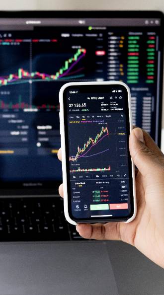analytical marketing analysis, concentrated expression, reviewing data, photorealistic, cozy office surrounded by bookshelves, highly detailed, graphs and charts displayed on monitors, high clarity image, muted colors, overhead lighting, shot with a 100mm lens