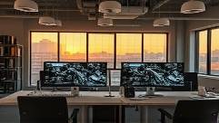 effective SEO optimization, analytical expression, implementing digital strategies, photorealistic, open-plan office with multiple monitors, highly detailed, seamless workflows, 8K resolution, warm earth tones, natural evening light, shot with a 28mm lens.